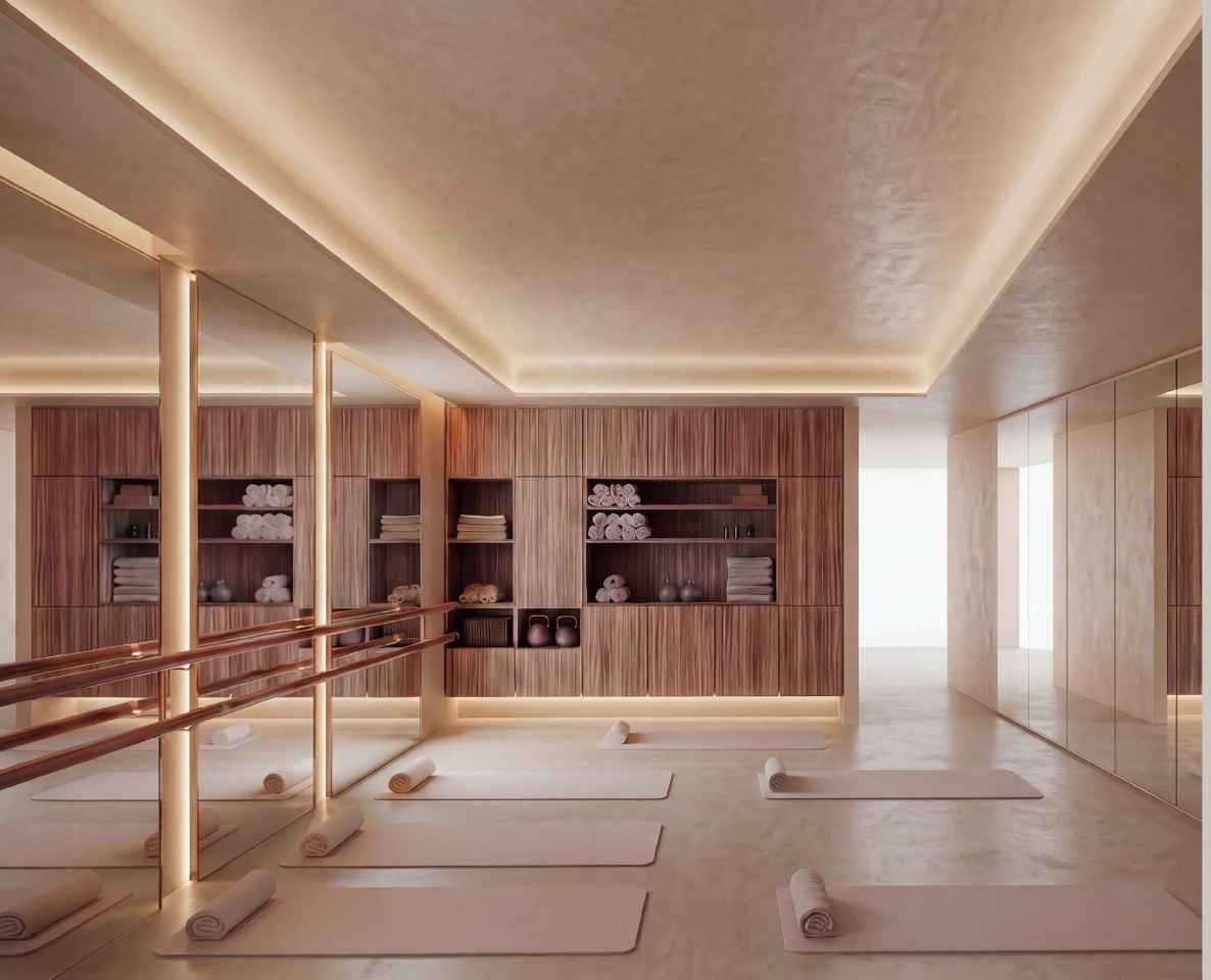 The Qlture Velázquez, Madrid: estudio de barre con espejos, barras de madera y mueble de nogal — Studio Eleven